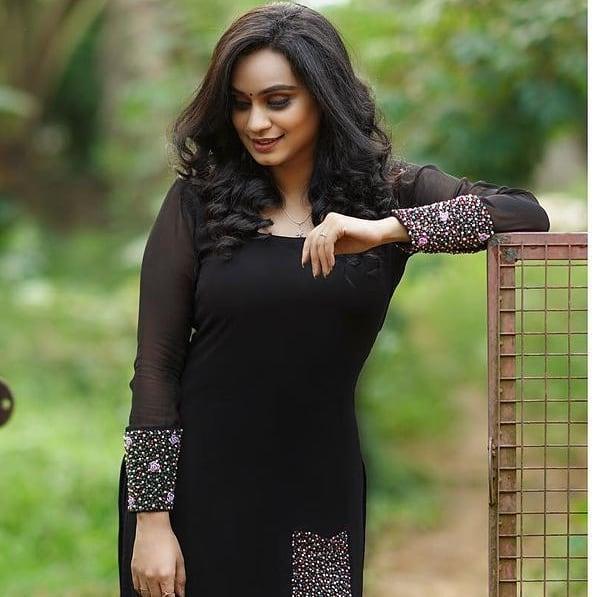Malayalam-anchor-in-Black-dress-hot-photos-lakshmi-nakshathra-latest-hot-and-sexy-photoshoot-50403.jpg