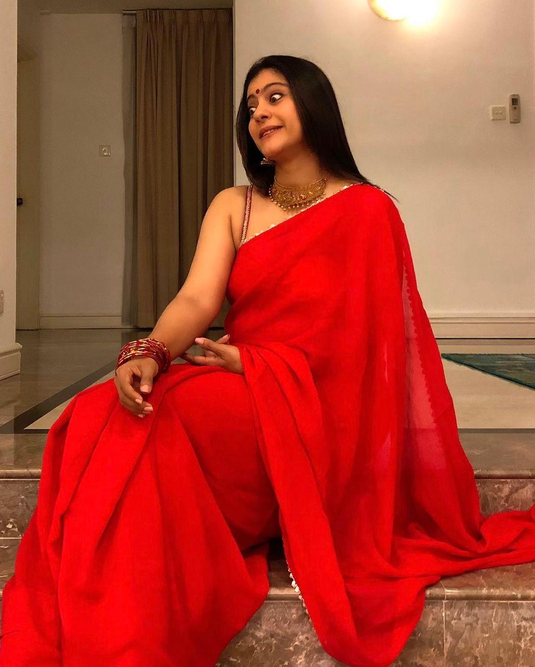 Bollywood actress Kajol devgan in red saree and sleeveless blouse hot photos | looking very glamorous photos Photos: HD Images, Pictures, Stills, First Look Posters of Bollywood actress Kajol devgan in red