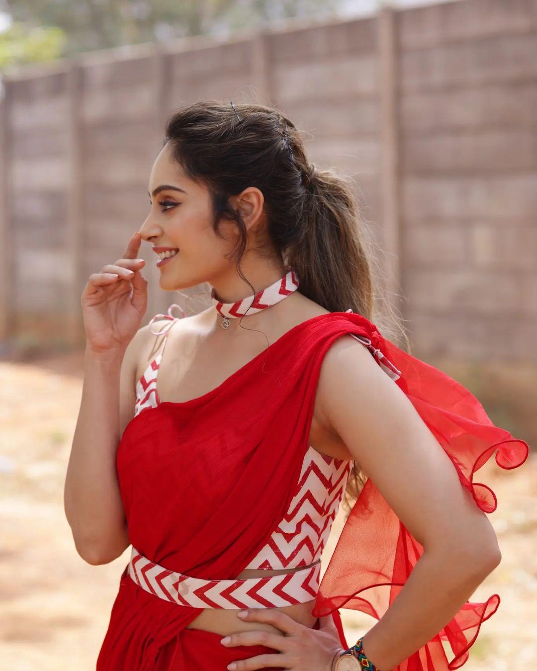 Shrutika Arjun in red saree hot and sexy photoshoot | hot and sexy photos  Photos: HD Images, Pictures, Stills, First Look Posters of Shrutika Arjun  in red saree hot and sexy photoshoot |