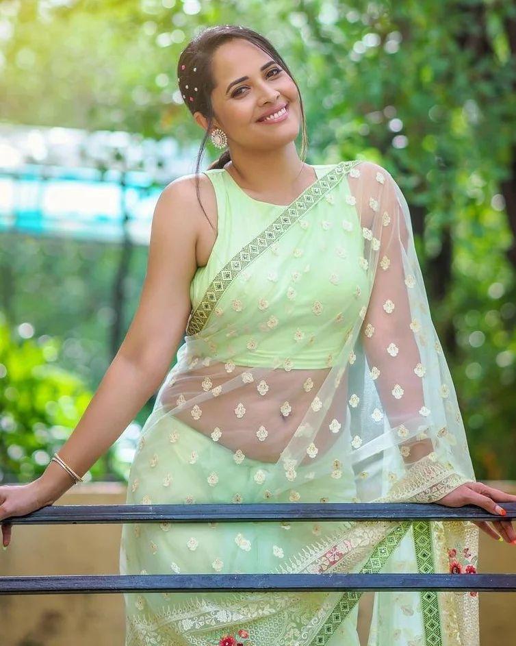 Beautiful And Sexy Photoshoot Anasuya Bharadwaj In Yellow Transparent Saree Hot Photos Photos